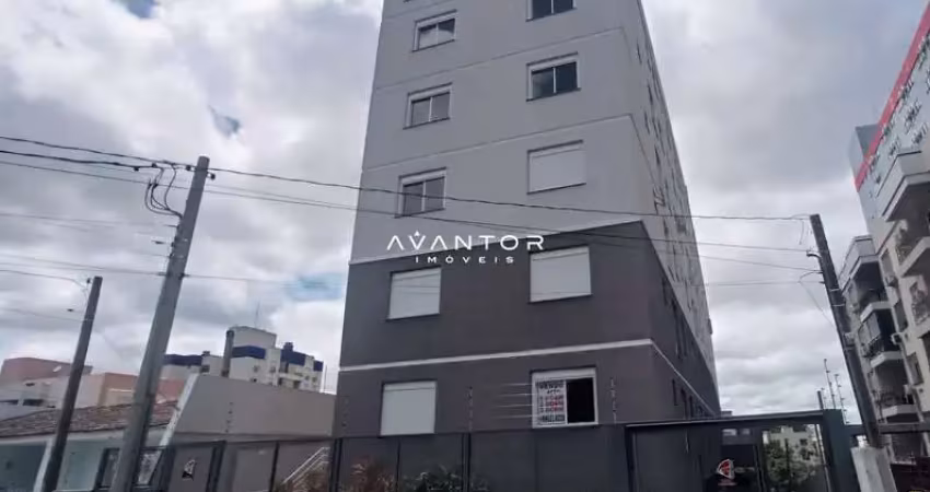 Apartamento central de 1 dormitório, suíte, sala de estar, cozinha e churrasquei