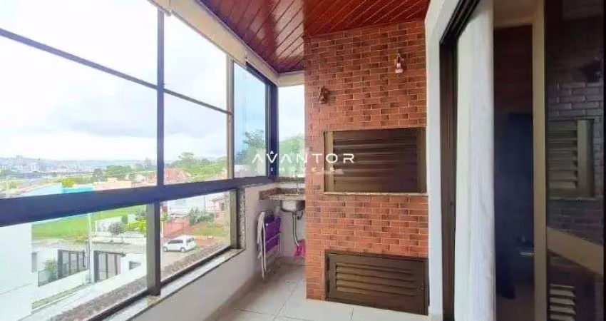 Apartamento 2 dormitórios com suíte e sacada com churrasqueira em bairro nobre.