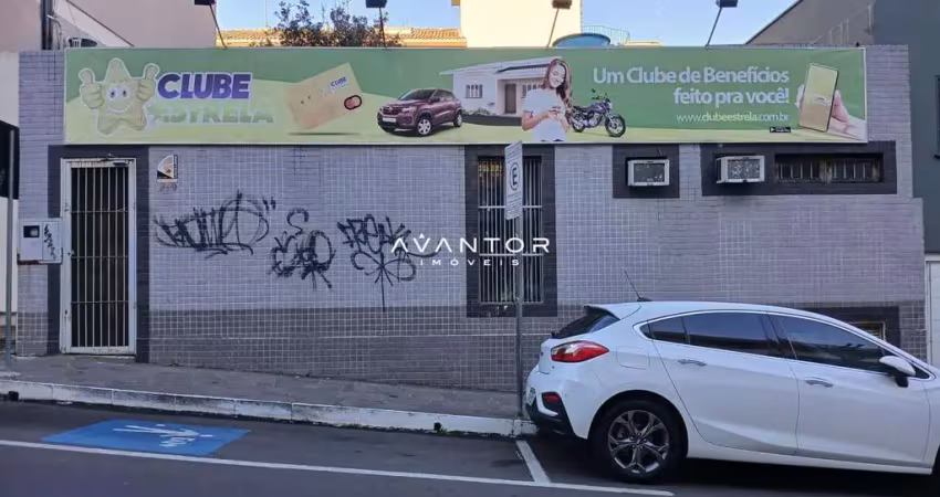 Ponto comercial de 105 m² no centro composto por 4 salas, banheiro e recepção.