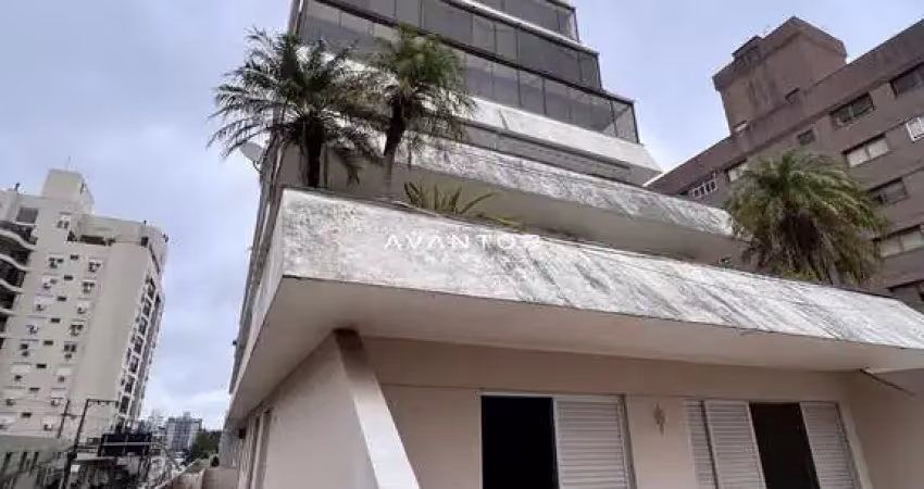 Amplo apartamento de 4 dormitórios, com terraço, no centro de santa maria