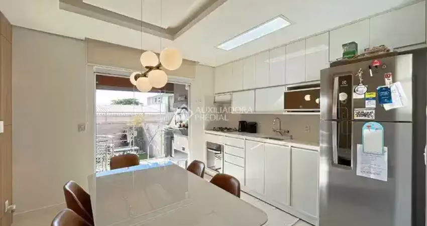 Casa com 3 quartos à venda na Rua Ilari Arlindo Basei, 81, Guarujá, Porto Alegre