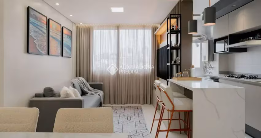 Apartamento mobiliado com projeto arquitetônico e infraestrutura completa – 2 dorms, 2 vagas, próximo à sogipa!