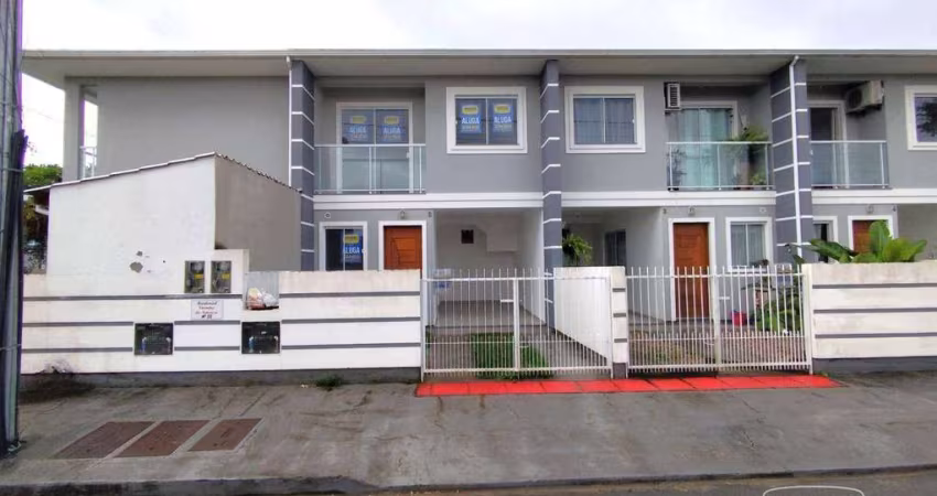 Casa com 2 dormitórios para alugar, 74 m² por R$ 2.697,40/mês - Forquilhas - São José/SC