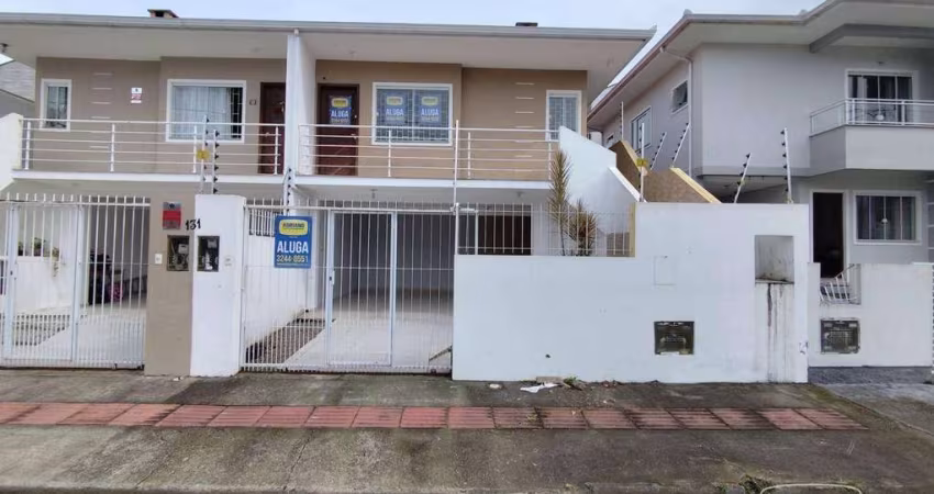 Casa com 3 dormitórios para alugar, 120 m² por R$ 3.671,65/mês - Potecas - São José/SC