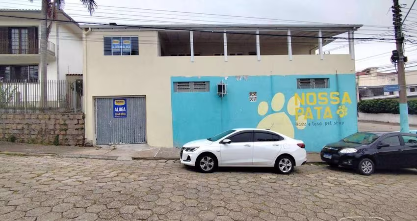 Casa com 4 dormitórios para alugar, 180 m² por R$ 5.293,68/mês - Estreito - Florianópolis/SC