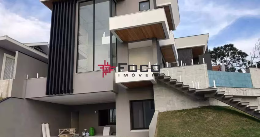 Casa com 4 dormitórios á venda, 477 m2 por R$ 3.600.000,00 - Condomínio Residencial Jaguary -