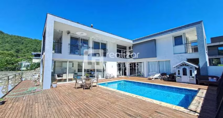 Casa em condomínio fechado com 4 quartos para alugar no Itacorubi, Florianópolis 