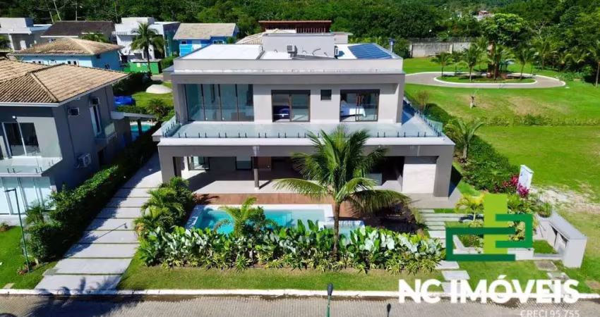 Locação por temporada | luxuosa casa em condomínio pé na areia.