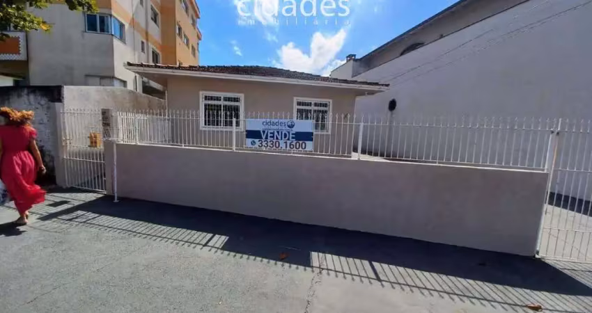 Terreno em Forquilhinha com 3 casas construídas