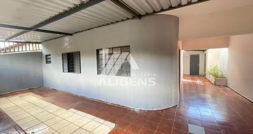 Casa com edícula