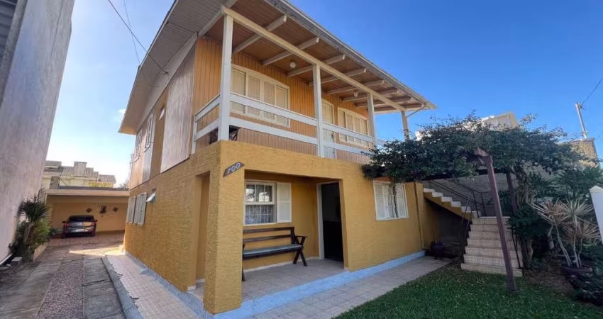 Casa com 3 dormitórios para alugar por R$ 1.300/mês - Centro - Balneário Arroio do Silva/SC