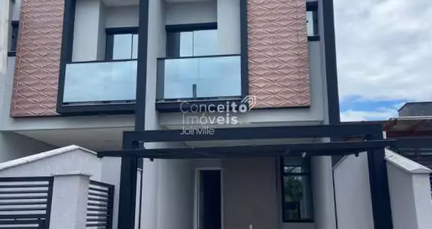 Exclusividade e conforto no saguaçu: geminado alto padrão