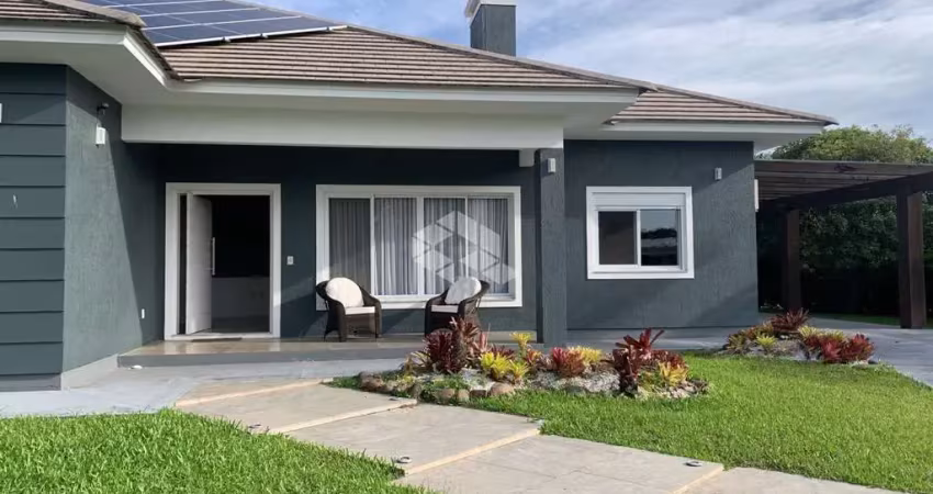 Casa com 3 suítes, piscina e 400m² em condomínio em tramandaí para vender por r$ 1.914,00