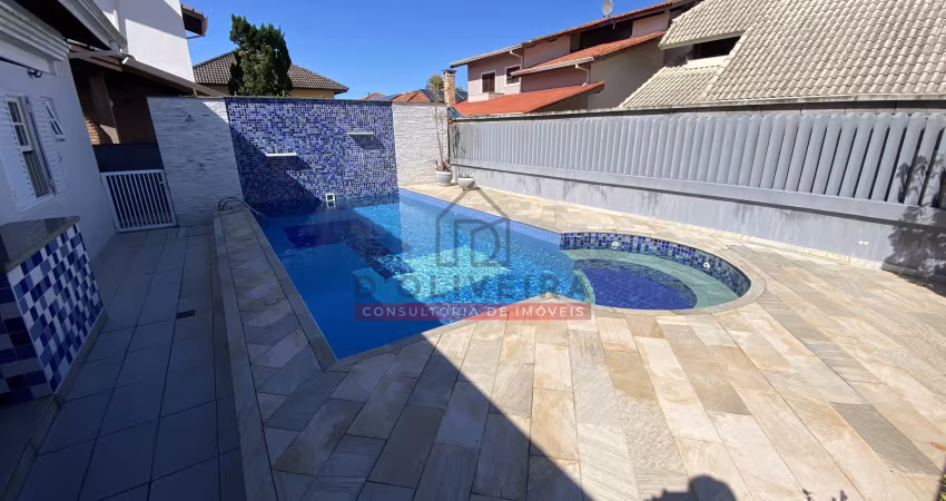 Casa térrea com piscina e churrasqueira no condomínio bougainvillée iii - peruíbe - sp