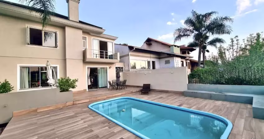 Casa de alto padrão em uma das ruas mais seguras de novo hamburgo no bairro jardim mauá: 4 dormitórios, 2 suites, 4 vagas, próximo ao parcão.