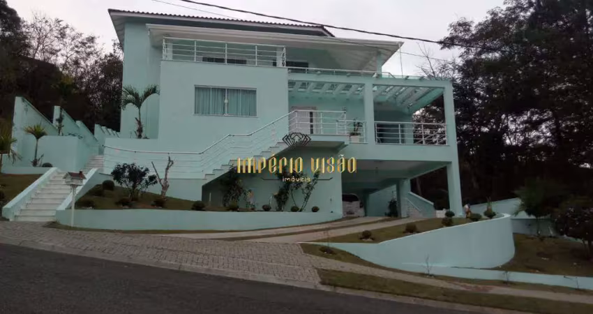 Casa de alto padrão com 4 suítes, cozinha americana e piscina á venda na reserva de ibirapitanga arujá divisa com santa isabel-sp