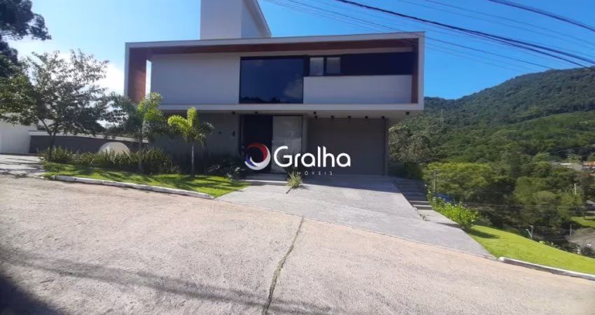 CASA EM CONDOMÍNIO- 4 SUÍTES