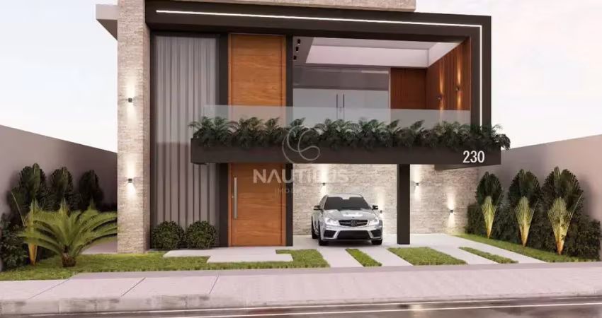 Casa duplex à venda em condomínio com 3 suítes e 4 vagas de garagem.