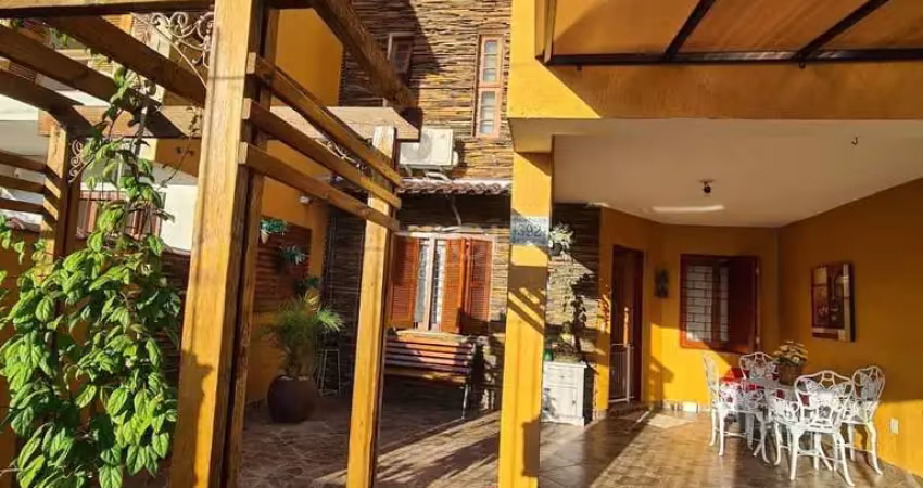 Casa com 4 quartos à venda na Rua Baldoino Bottini, 392, Hípica, Porto Alegre