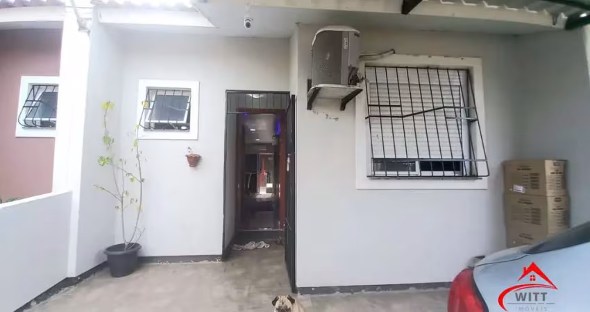 Casa com 2 quartos à venda na Rua Milton dos Santos Martins, 41, Restinga, Porto Alegre