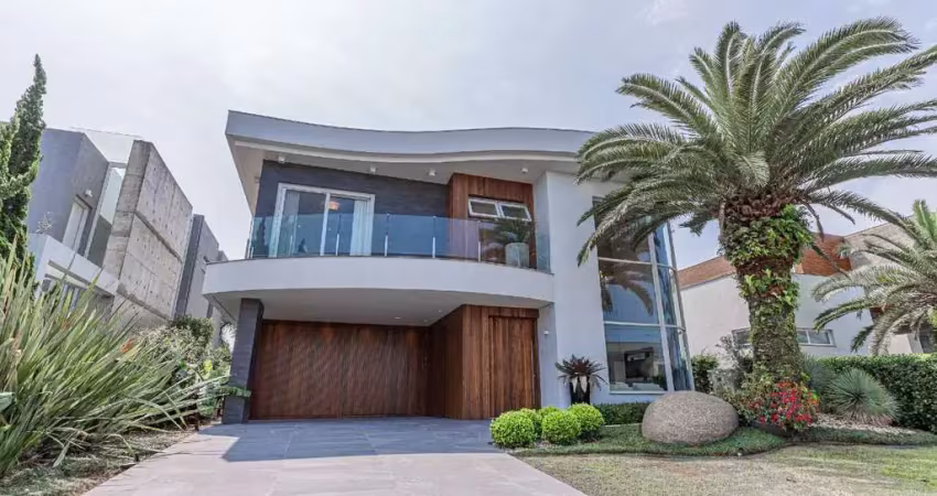 Sobrado à venda, 5 quartos, 5 suítes, 2 vagas, condomínio enseada lagos de xangri-lá - xangri-lá/rs