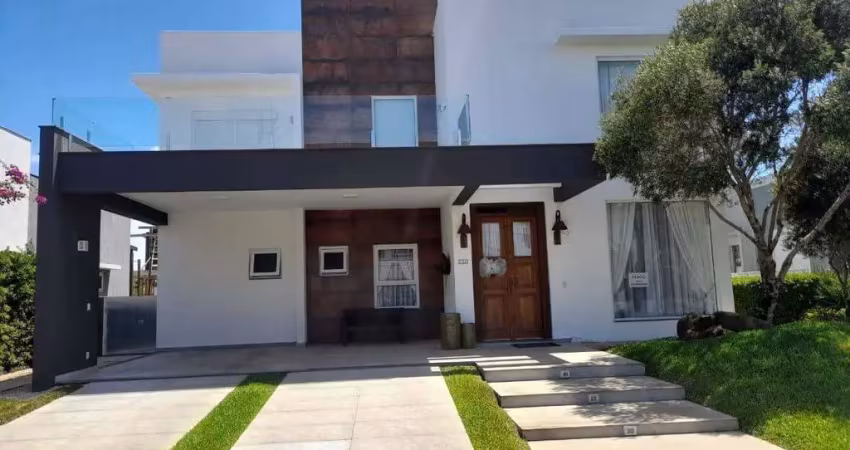 Sobrado à venda, 5 quartos, 5 suítes, 2 vagas, condomínio quintas do lago - xangri-lá/rs