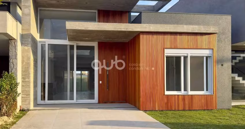 Casa à venda com 4 suítes, 5 banheiros, 2 vagas de garagem, no condomínio sunset, em xangri-lá/rs.