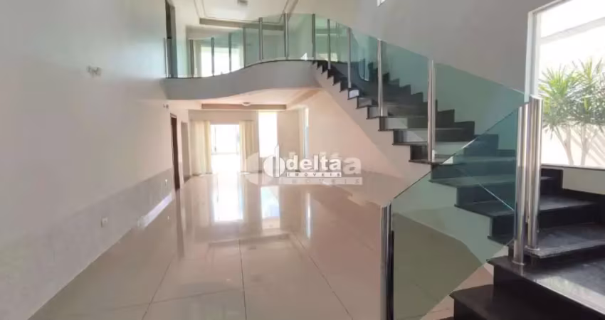 Casa residencial com 4 suítes disponível para locação no bairro jardim karaíba em uberlândia-mg.