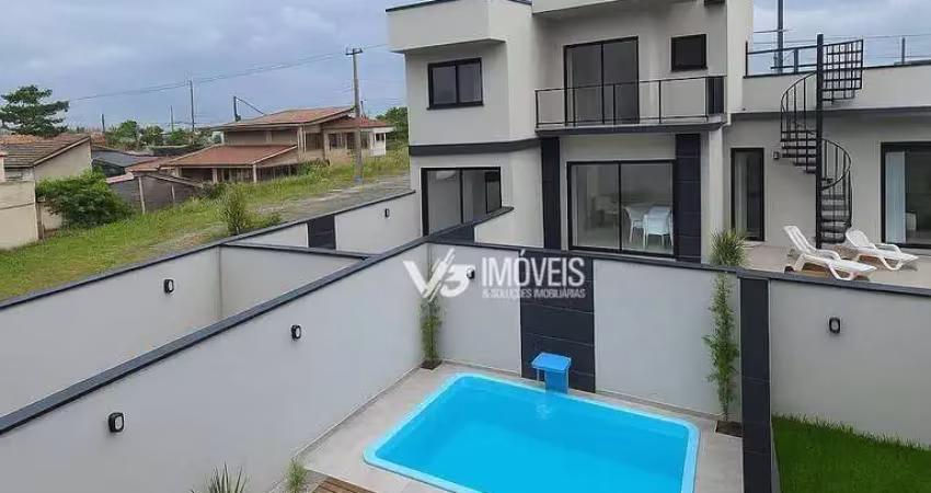 Triplex com vista para o mar e para as montanhas, com 3 suítes e 2 churrasqueiras em ambientes diferentes.
