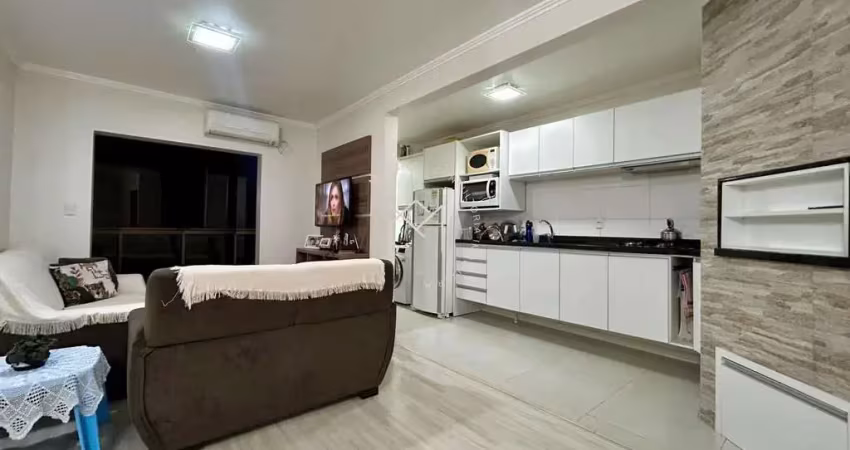 Apartamento de 2 dormitórios com sacada fechada e móveis planejados no verena