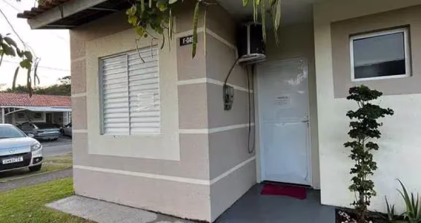 Casa em condomínio fechado com 2 quartos à venda na Avenida Paulo Roberto Vidal, 2494, Caminho Novo, Palhoça