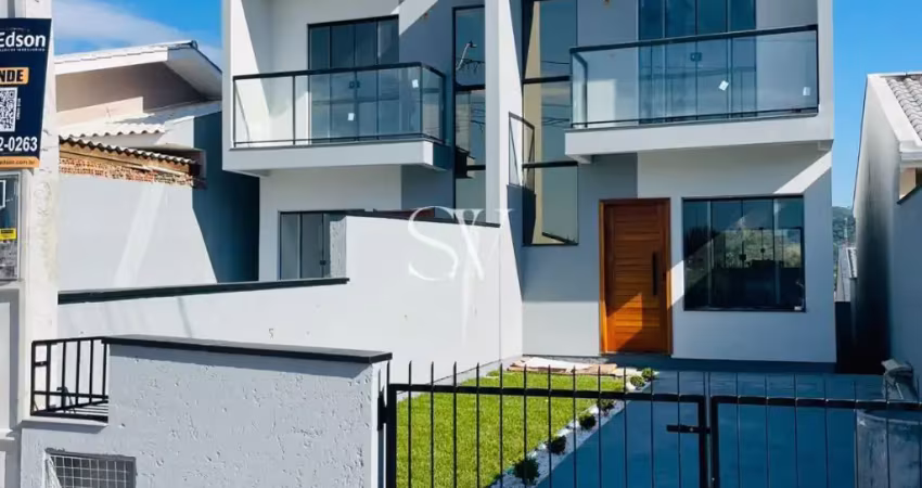 Casa tipo sobrado a venda sendo 02 suítes no loteamento jardins ii em palhoça-sc