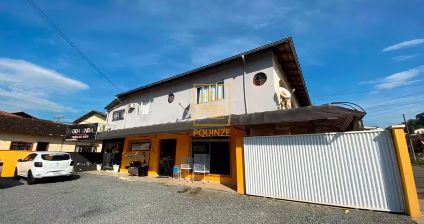 Casa com salas comerciais a venda no bairro quintino