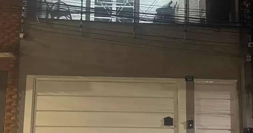 Lindo sobrado para venda sagrado coração próximo a estação de trem com 3 quartos vaga para 2 carros com uma casa de 3 cômodos em cima