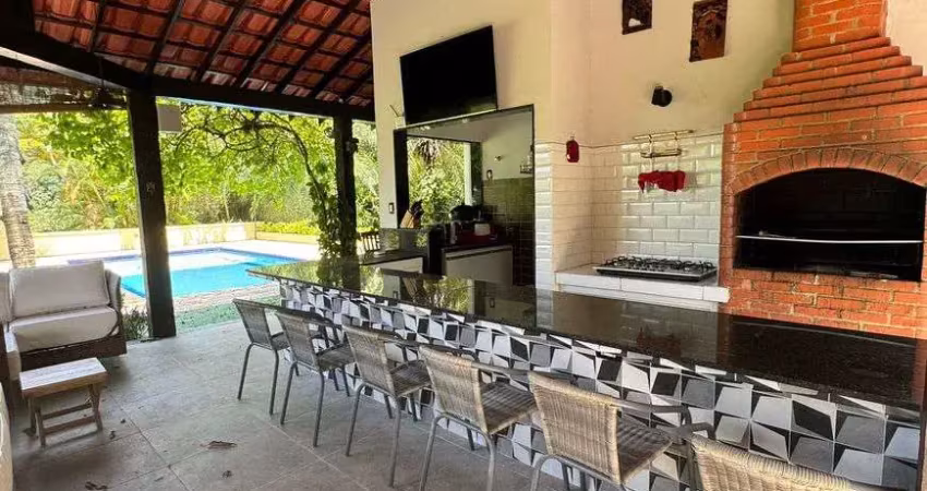 Casa de condomínio para venda com 697 metros quadrados com 5 quartos
