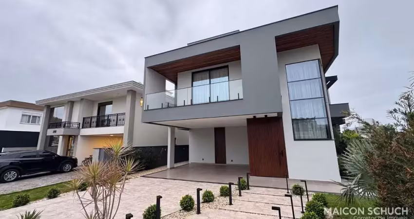 Casa com 4 suítes, sala de cinema, mobiliada e decorada, condomínio fechado, praia dos ingleses, florianópolis/sc.
