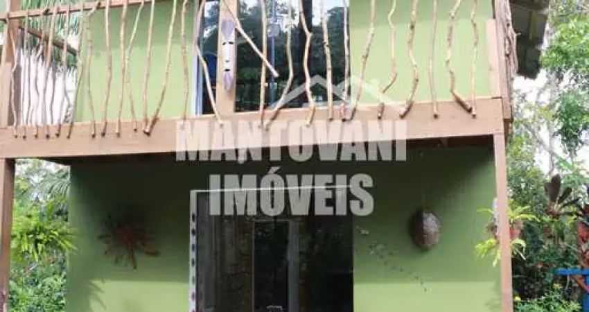 Terreno que contém 2 imóveis e 1 ponto comercial para venda ilha do mel.