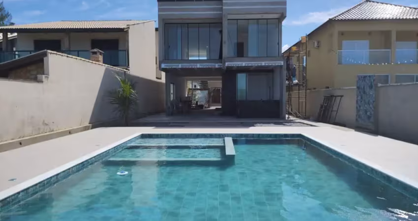 Deslumbrante casa de frente para o mar no condomínio belize em itanhaém
