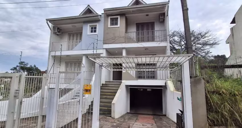 Casa com 3 quartos à venda na Rua Claudio da Silva Pinto, 612, Espírito Santo, Porto Alegre