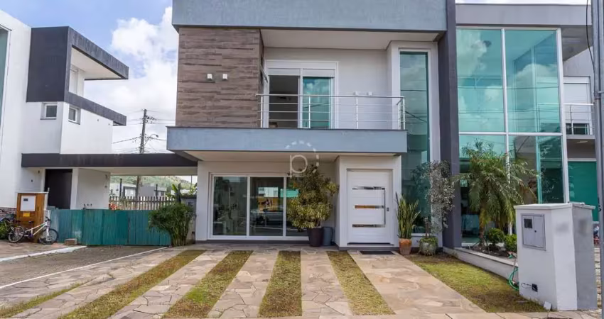 Casa em condomínio fechado com 3 quartos à venda na Rua Eroni Soares Machado, 300, Hípica, Porto Alegre
