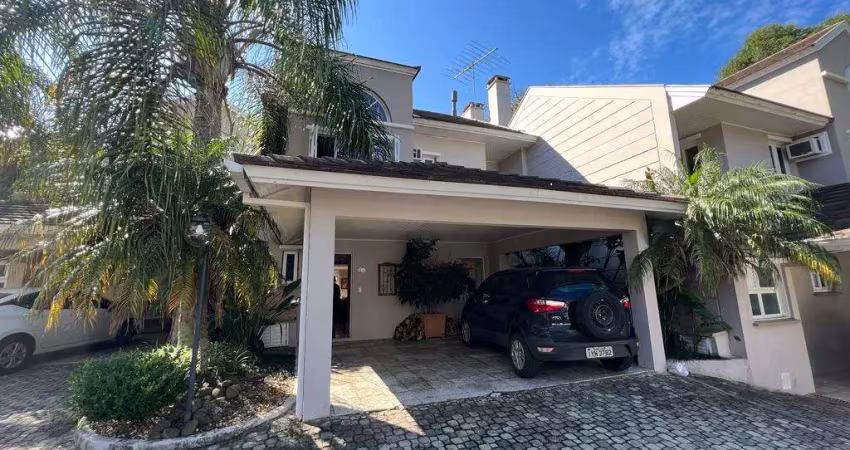 Casa em condomínio fechado com 3 quartos à venda na Avenida Coronel Marcos, 483, Pedra Redonda, Porto Alegre
