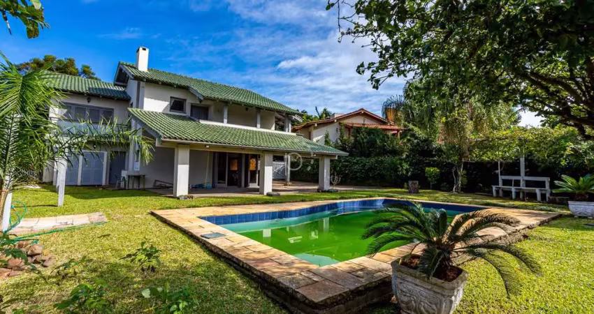 Casa em condomínio fechado com 3 quartos à venda na Avenida Firmino Octávio Bimbi, 255, Cavalhada, Porto Alegre