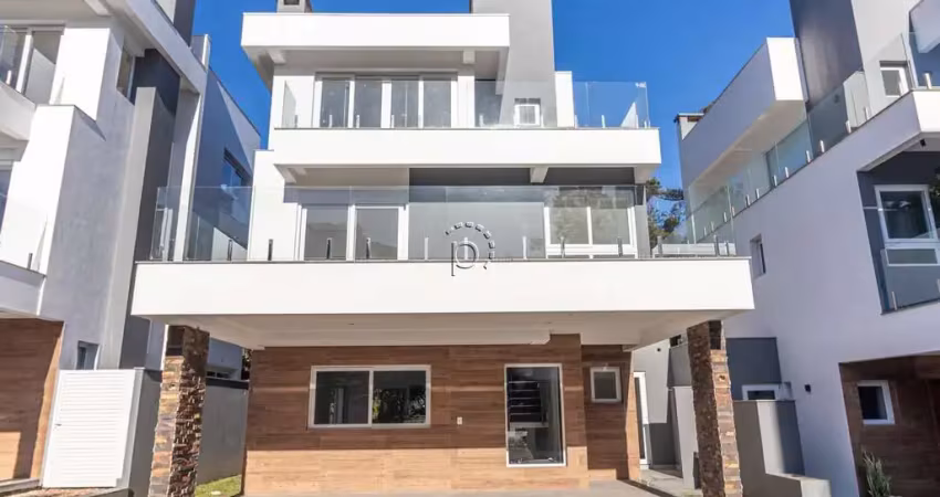 Casa em condomínio fechado com 3 quartos à venda na Avenida Coronel Marcos, 1239, Pedra Redonda, Porto Alegre