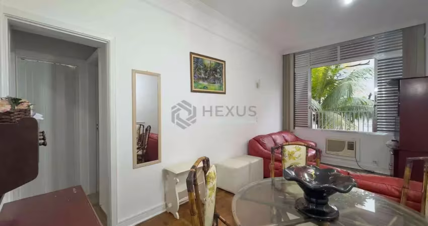 Apartamento com vista livre a uma quadra da praia das pitangueiras de 2 quartos (1 suíte) com 1 vag
