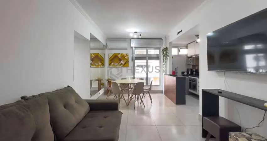 Apartamento reformado e mobiliado a uma quadra da praia das pitangueiras de 2 quartos (1 suíte) com