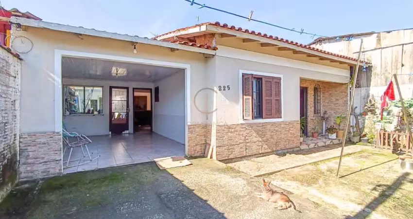 Casa com 02 dormitórios, sendo uma suíte e duas vagas de garagens coberta no bairro olaria