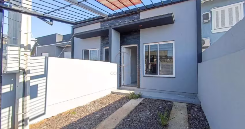 Casa térrea nova com 02 dormitórios, rebaixo de gesso,porcelanato e uma vaga de garagem no bairro olaria