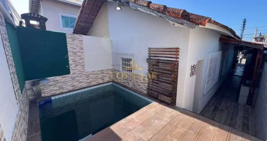 Casa térrea com 2 quartos, piscina e churrasqueira - maracanã - praia grande