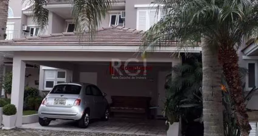 Casa em condomínio fechado, às margens do rio guaíba,