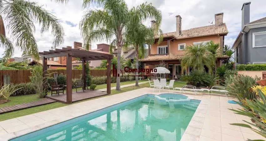 Casa em condomínio 4 dormitórios à venda belém novo porto alegre/rs